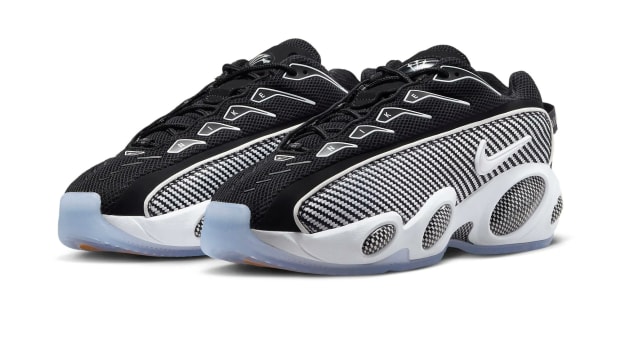 Side view of Drake's black and white Nike sneakers.